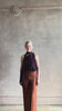 Video of woman reviewing Veronica Beard Darell Pant comfort stretch high-rise wide leg cropped cuffed hemline 