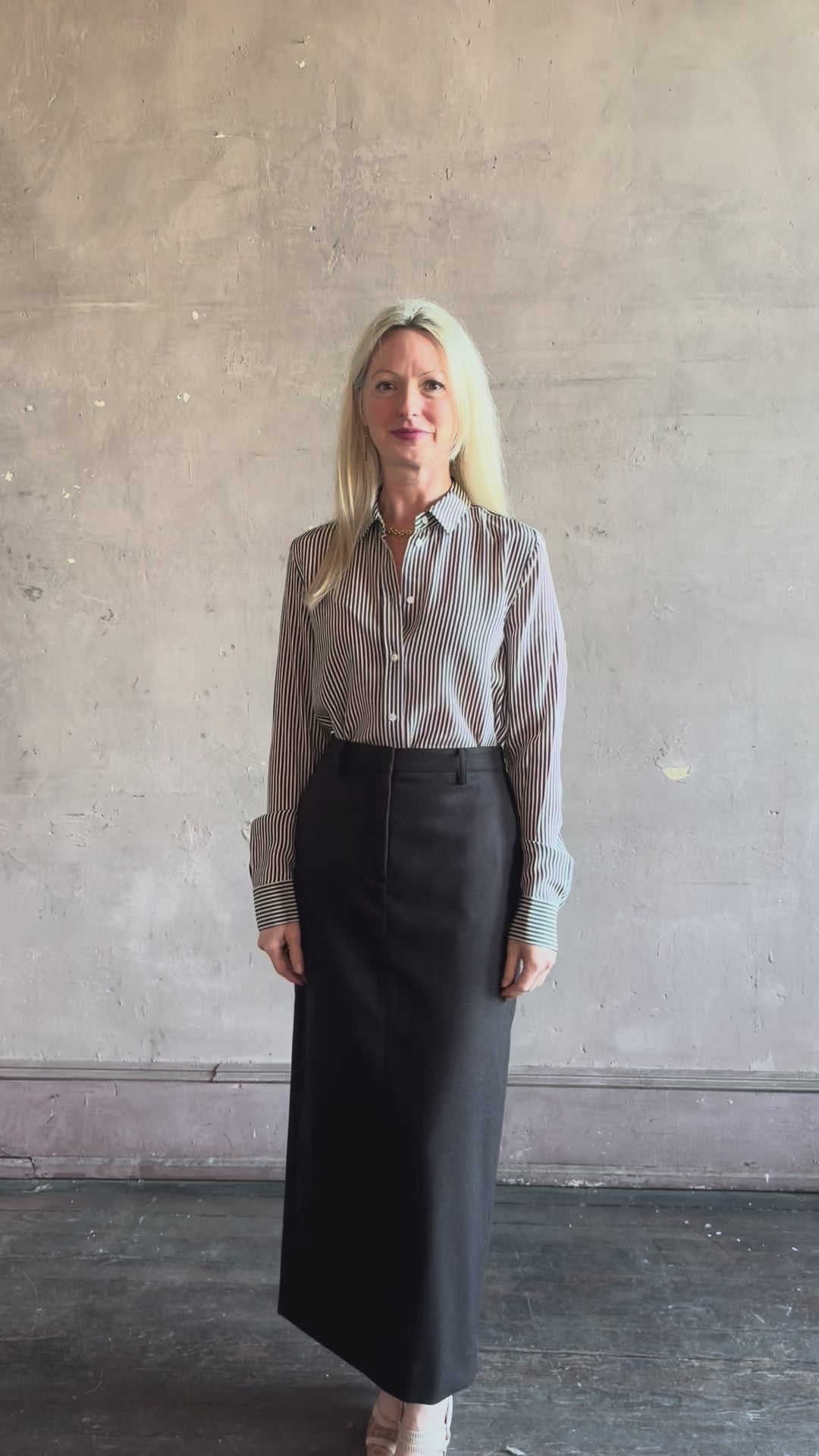 Video reviewing Nili Lotan Gaia Slim Silk Shirt in Dark Brown/Cream Stripe classic collar, cuffed sleeves Made in the USA