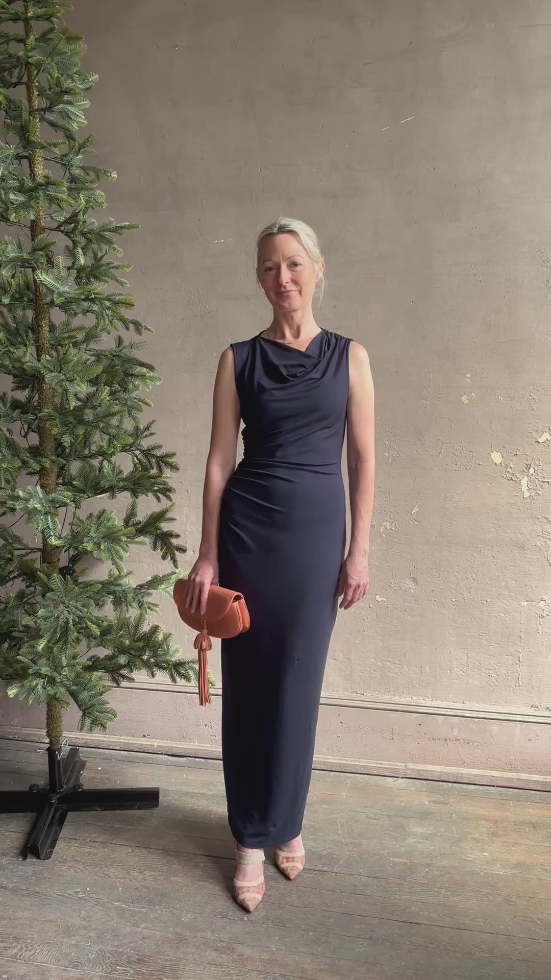 Mature woman reviewing VERONICA BEARD Kerilyn navy blue maxi sheath Dress in a comfortable elevated casual wear fabric