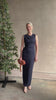 Mature woman reviewing VERONICA BEARD Kerilyn navy blue maxi sheath Dress in a comfortable elevated casual wear fabric