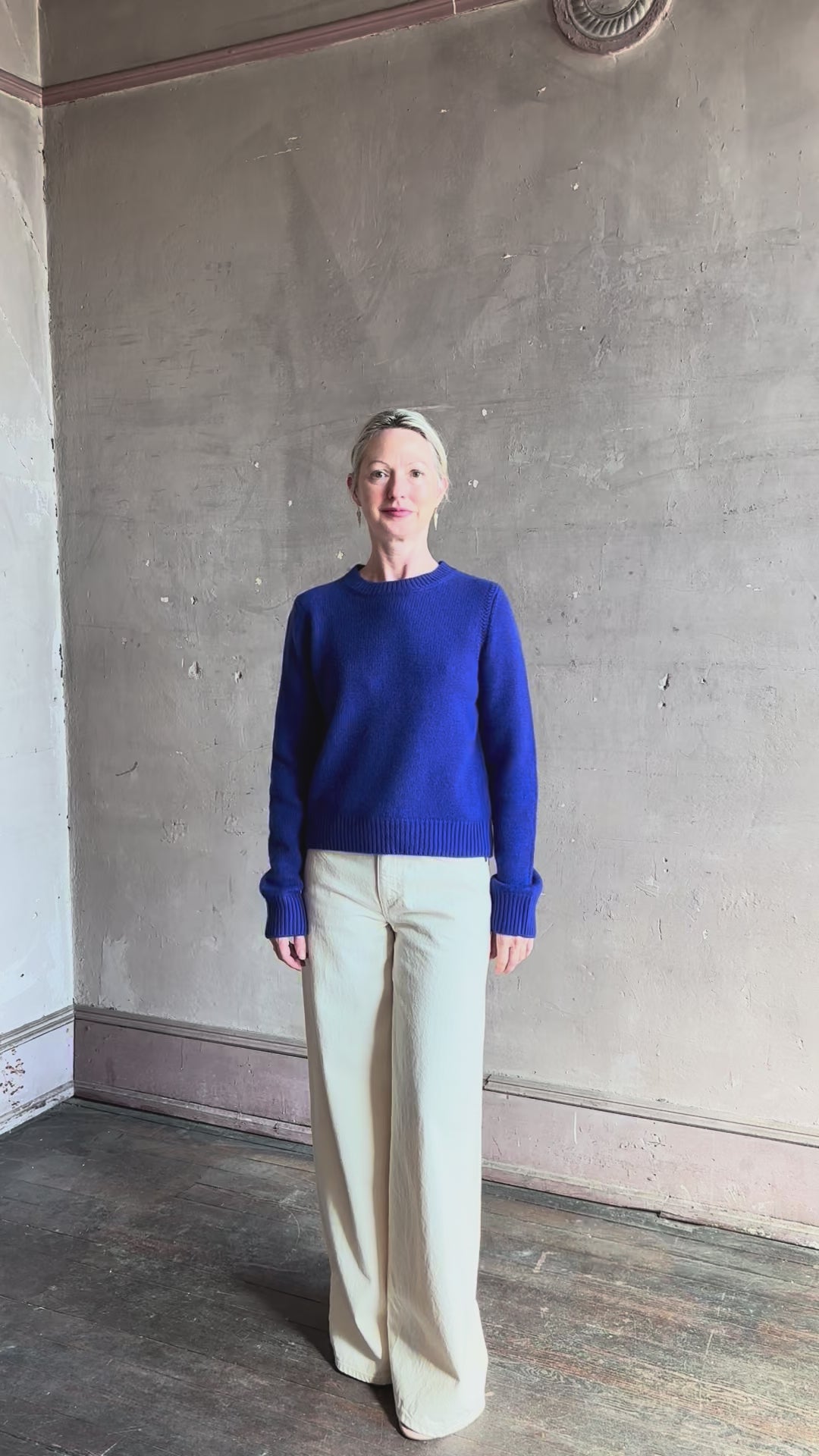 Video reviewing a vibrant cobalt blue Sablyn crewneck knit shrunken crewneck long sleeve cashmere sweater 