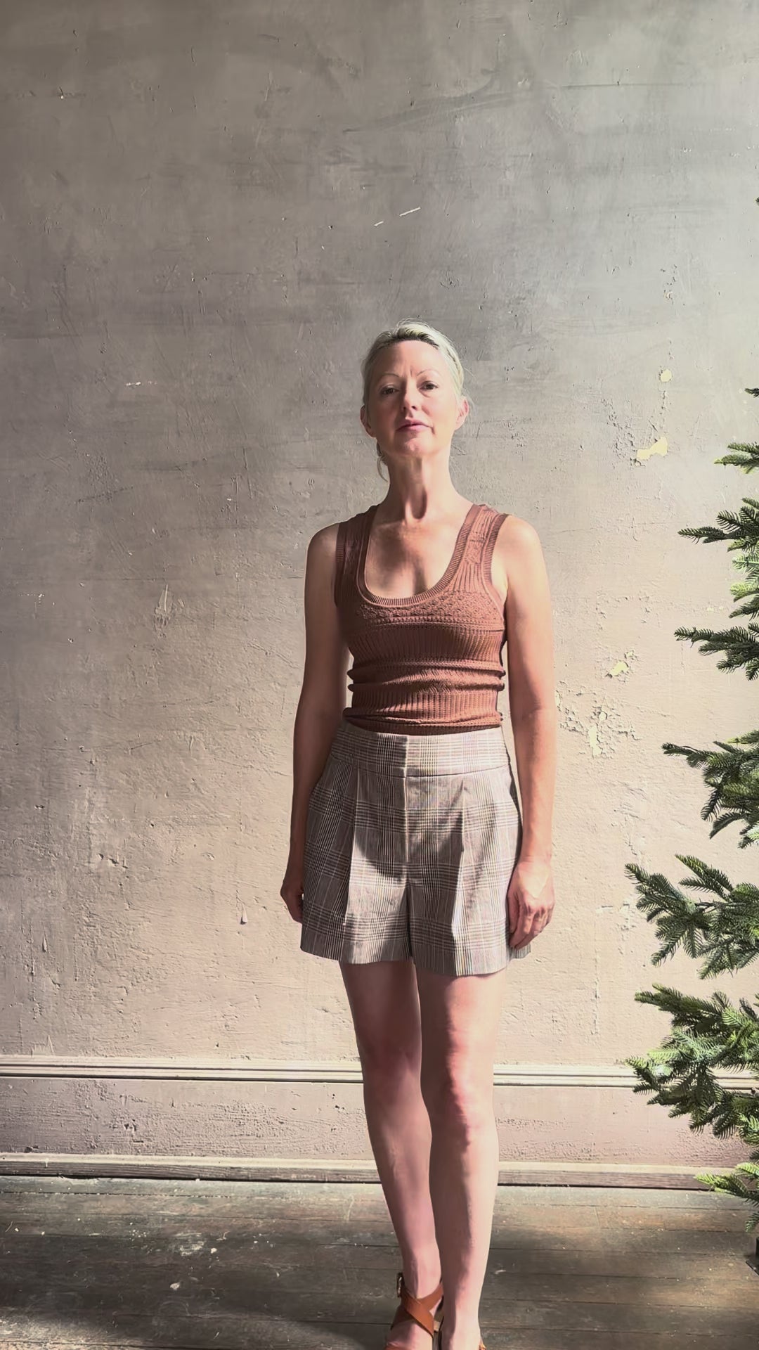 Video review of Veronica Beard Sandra Tank Top in a soft neutral nude and crafted from a  rayon nylon blend with scoop neckline 