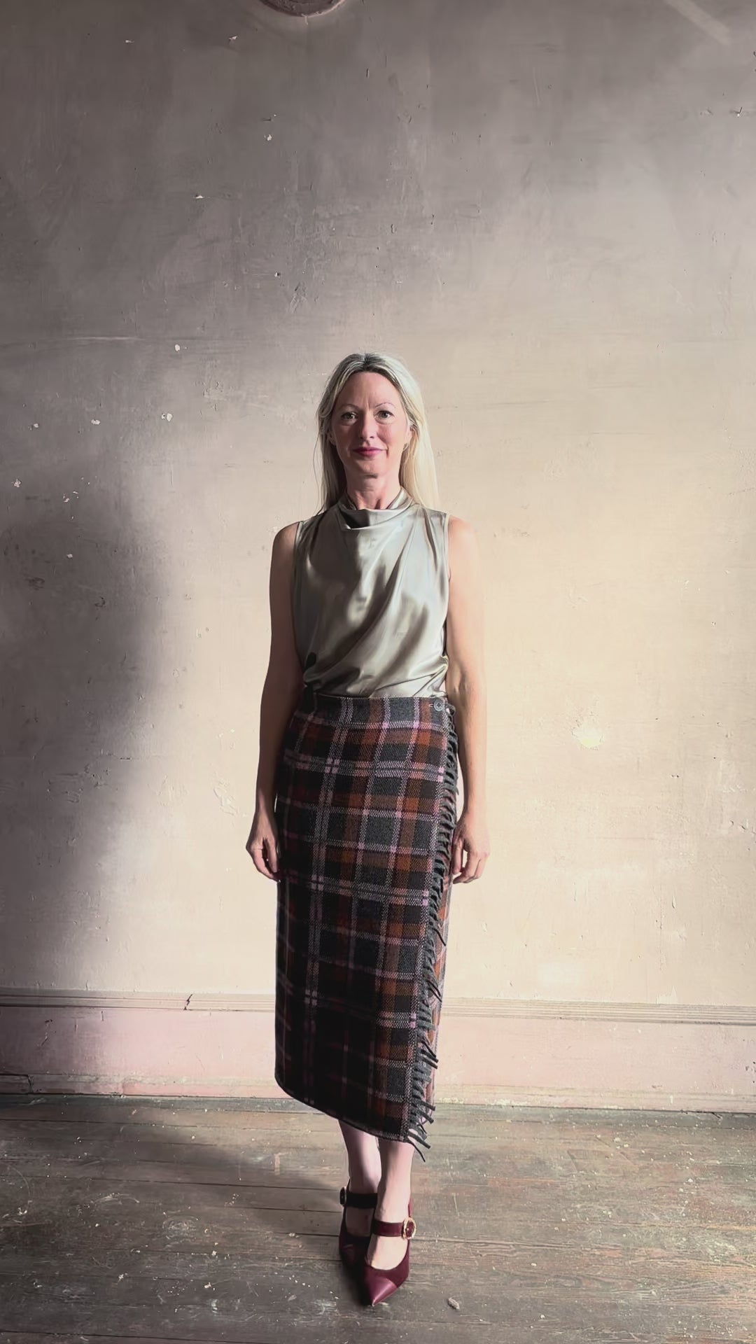 Video reviewing Guest in Residence Tartan Wrap Skirt in Sprinkle Combo wool-cashmere midi pencil silhouette and fringe trim