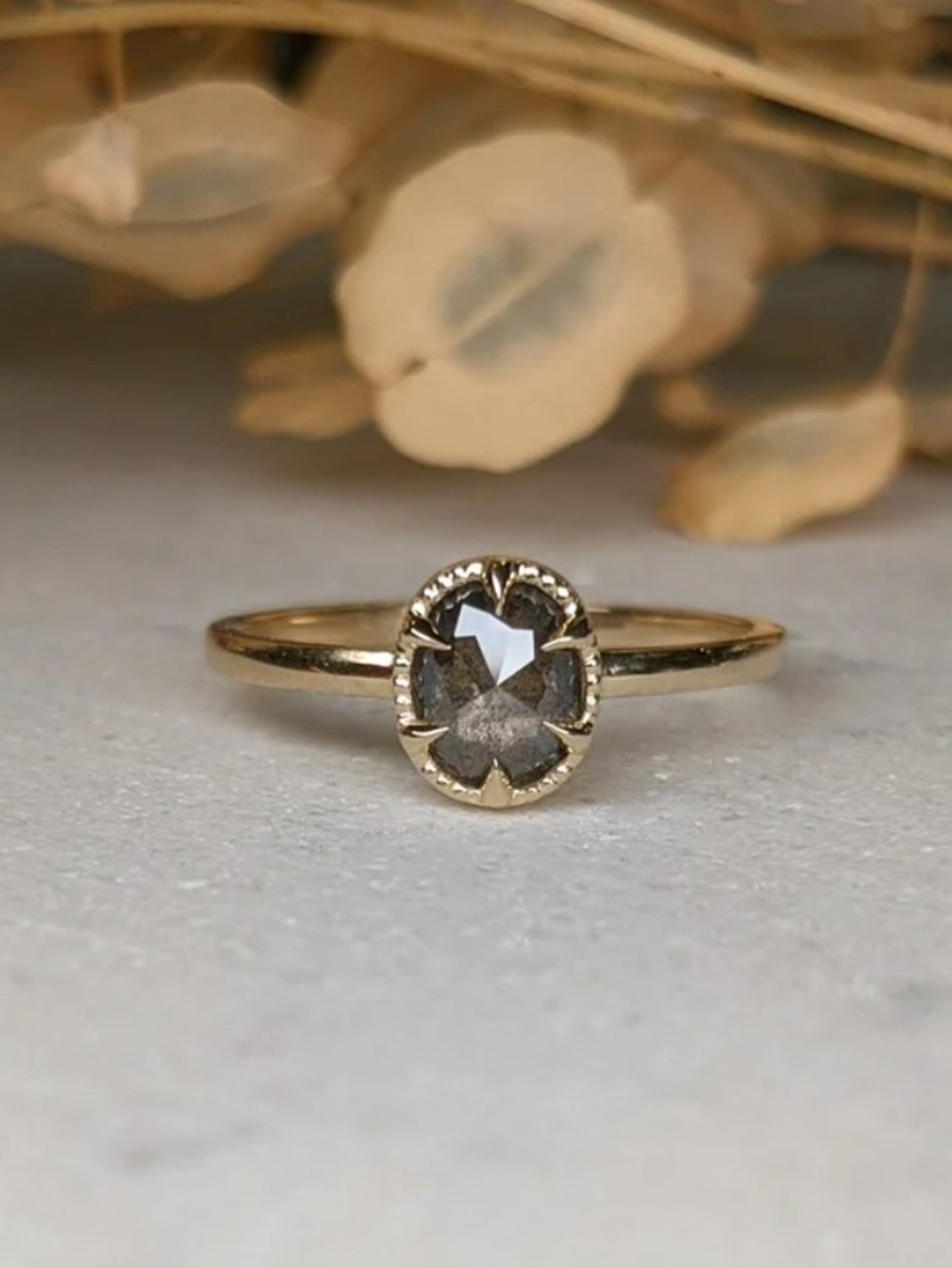 Image of luxury Asheville jeweler STEPHANIE ELLIS Oval Stacker Ring in 14K Recycled Yellow Gold Salt and Pepper Diamond