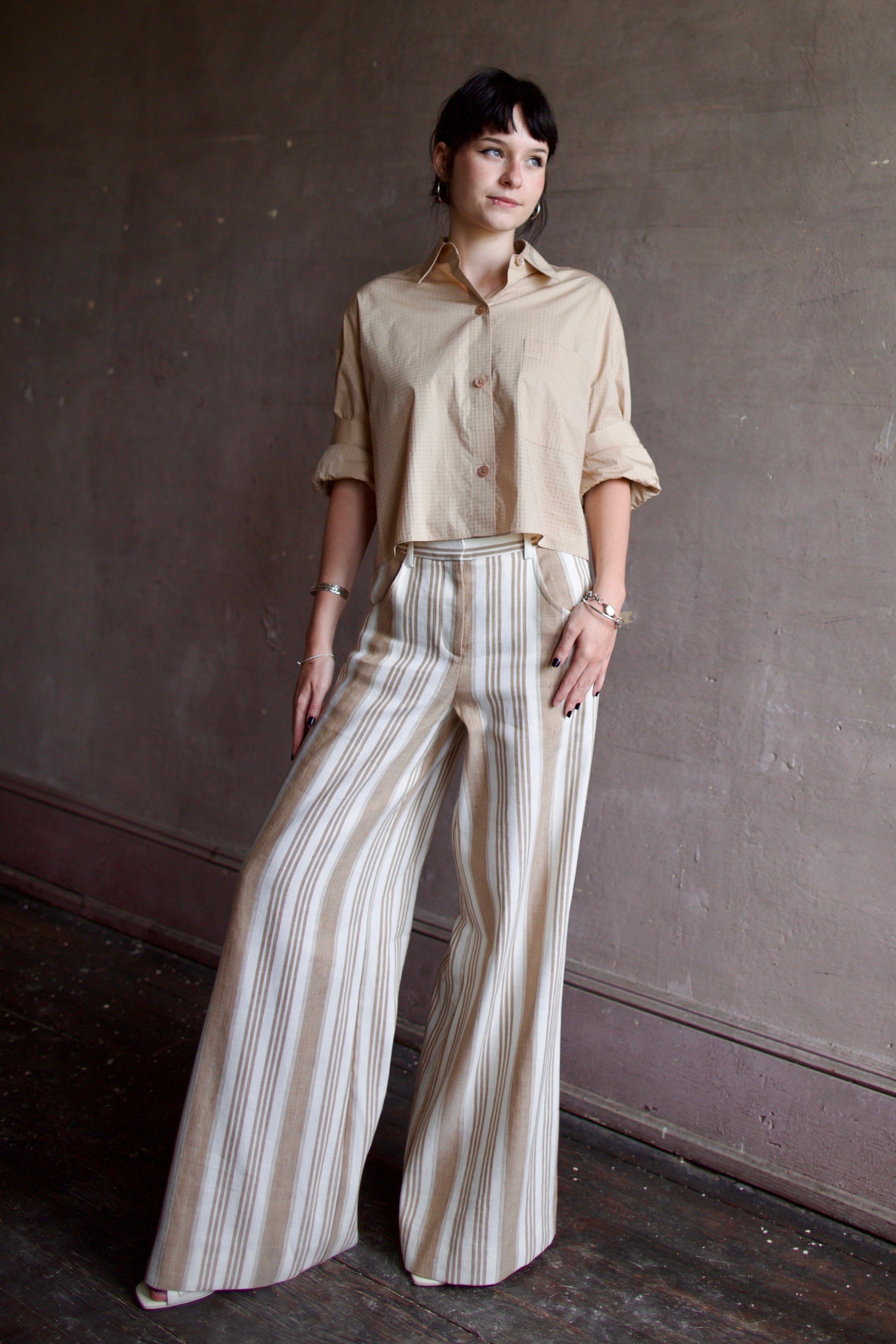 Image of a woman wearing the Next Ex Top with Crystals and Demie Trousers with Pintucks