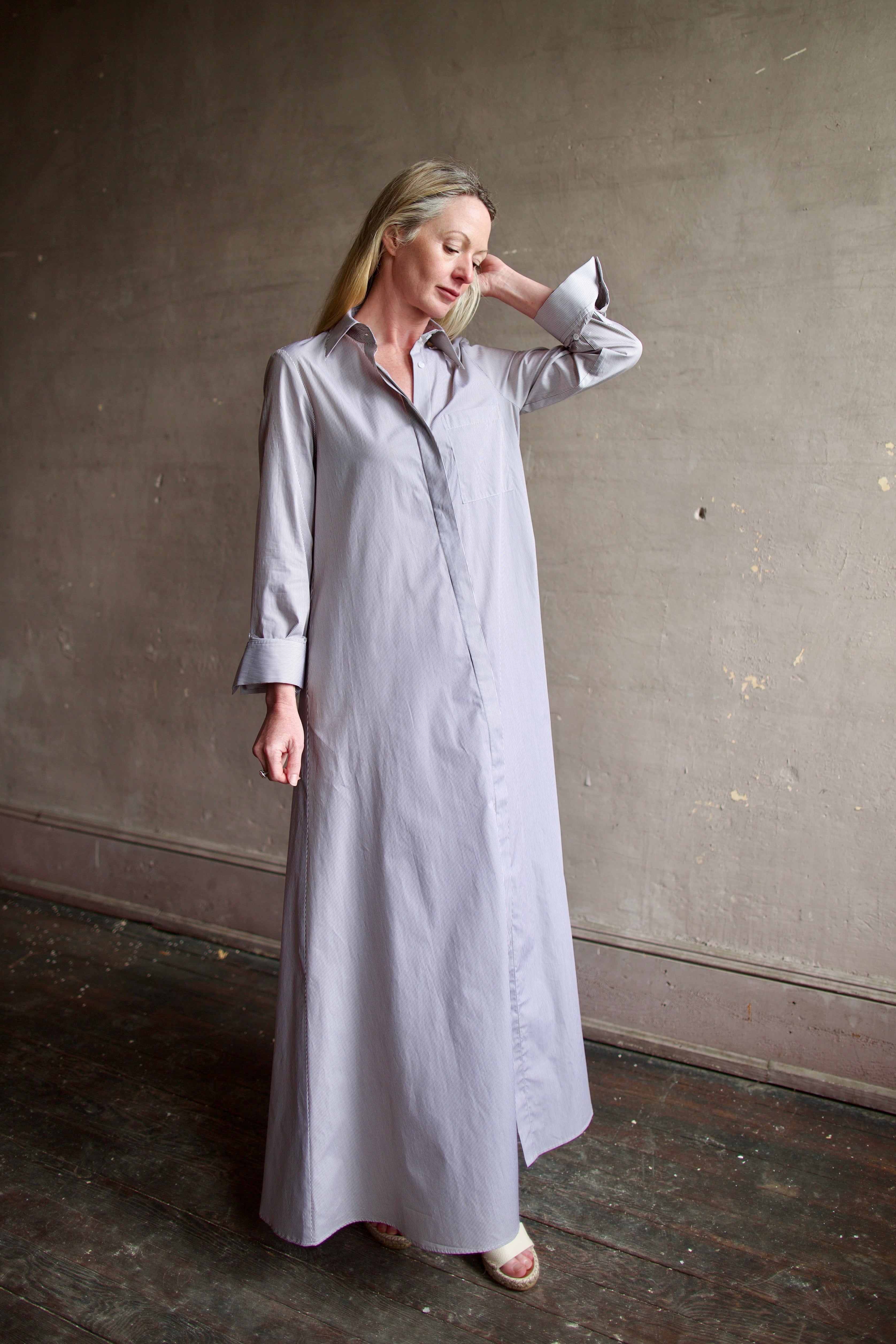 Image of a woman wearing the  TWP Jenny's Gown in Brown Stripe