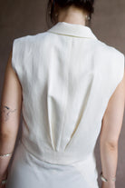 Back detail of a woman wearing the TWP Katie Cropped Tailored Vest