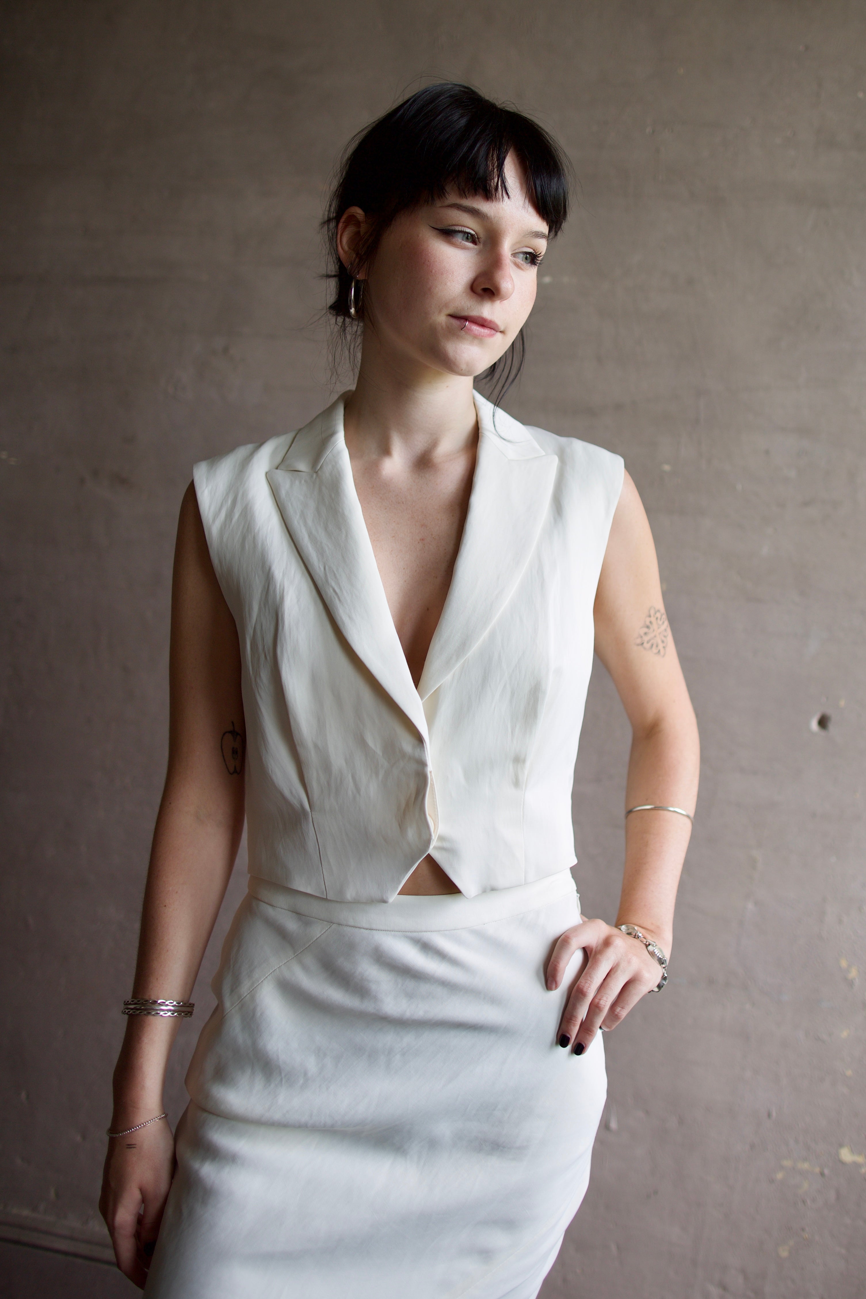 Image of a woman wearing the TWP Katie Cropped Tailored Vest