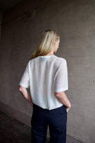 Back Image of a woman wearing the TWP Knit Tee with Pointelle in Ivory