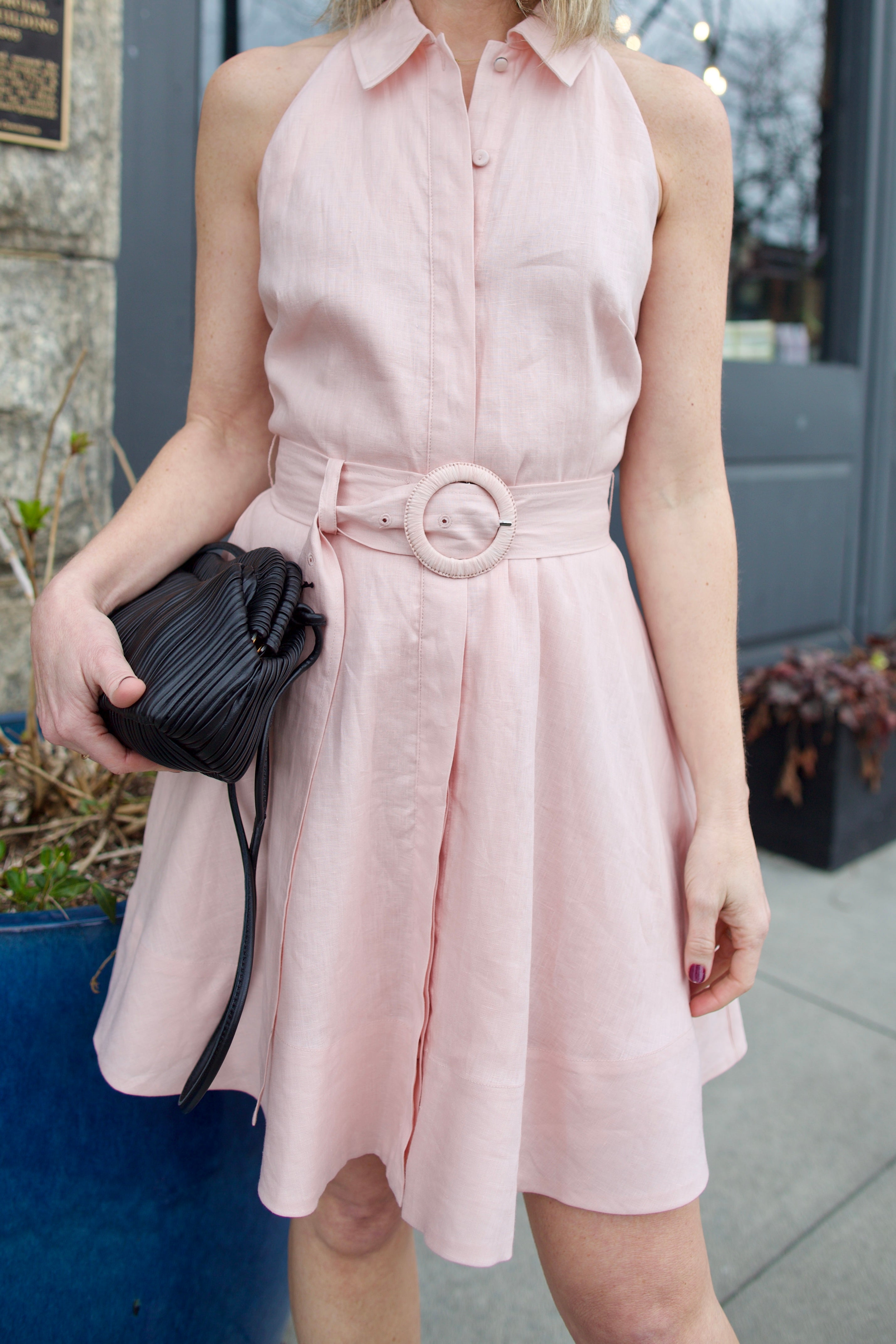 Mature woman wearing luxury women's Veronica Beard timeless linen Beau short dress with flowy skirt in expert American 